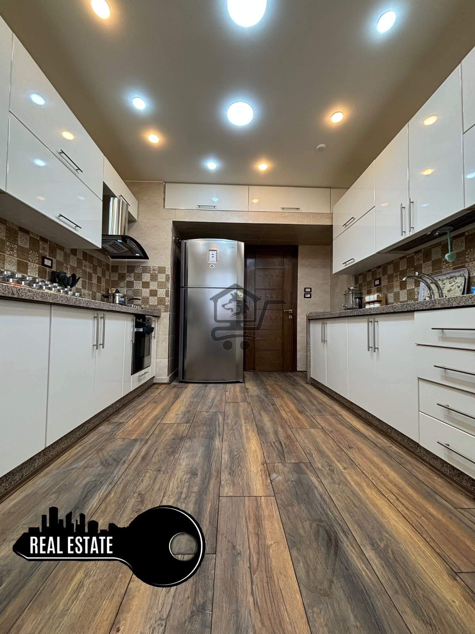 شقة ارضية مع حديقة - الصورة 2