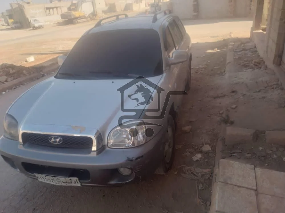 سانتافيه 2003 - الصورة 1