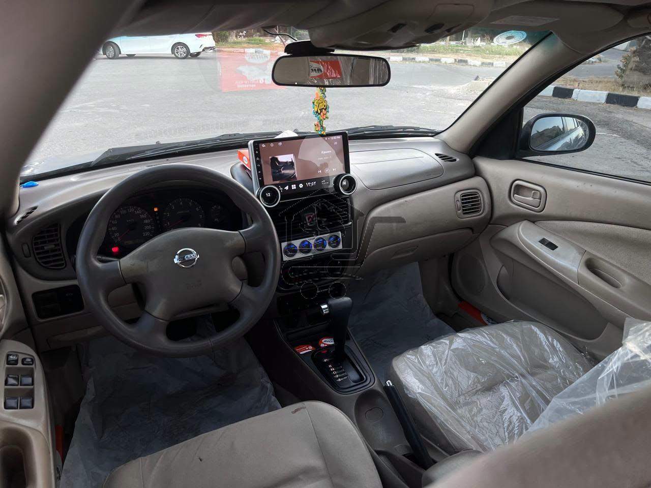 Nissan Sunny 2004 - الصورة 6
