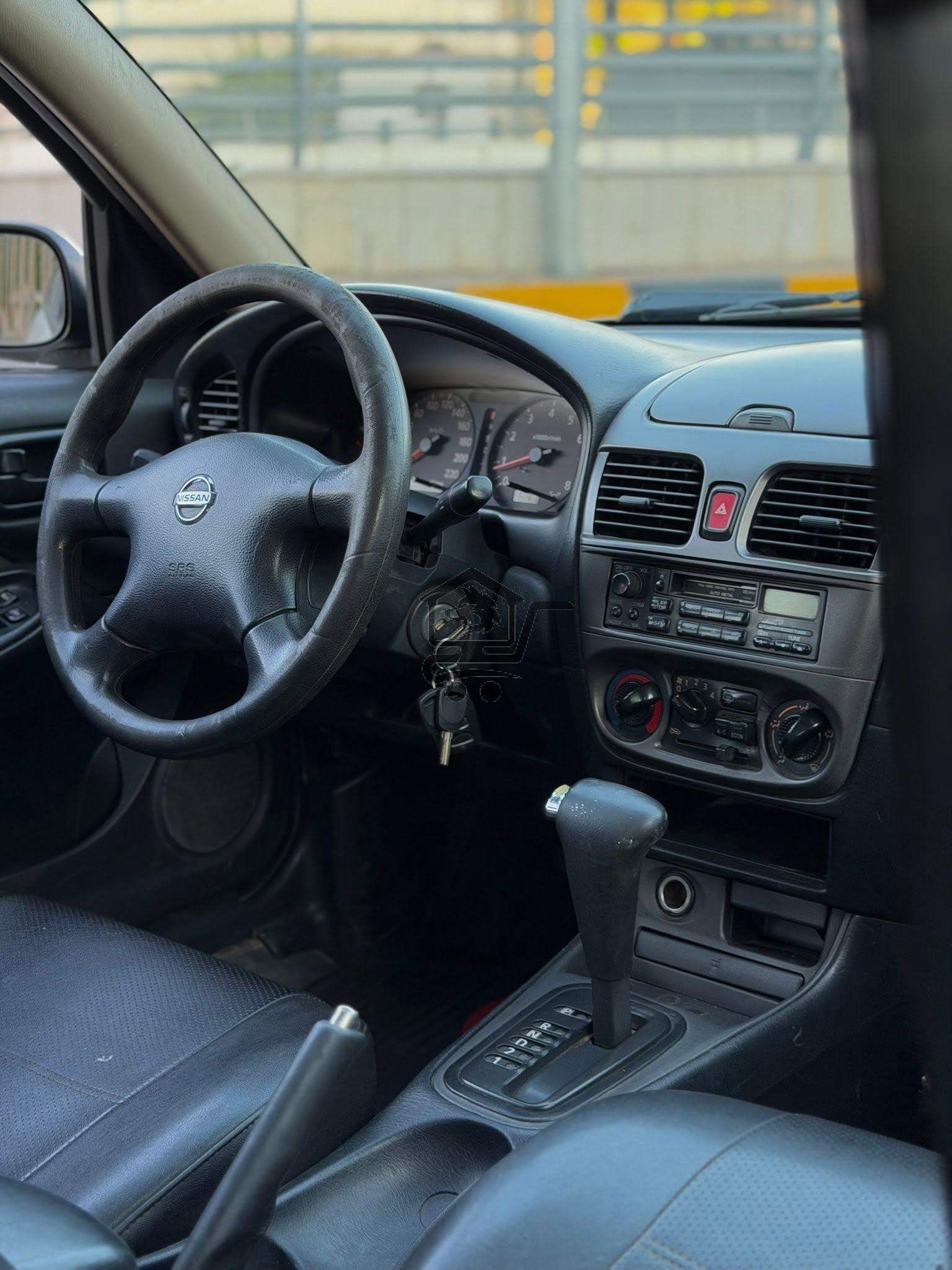 Nissan Sunny 2004 - الصورة 7