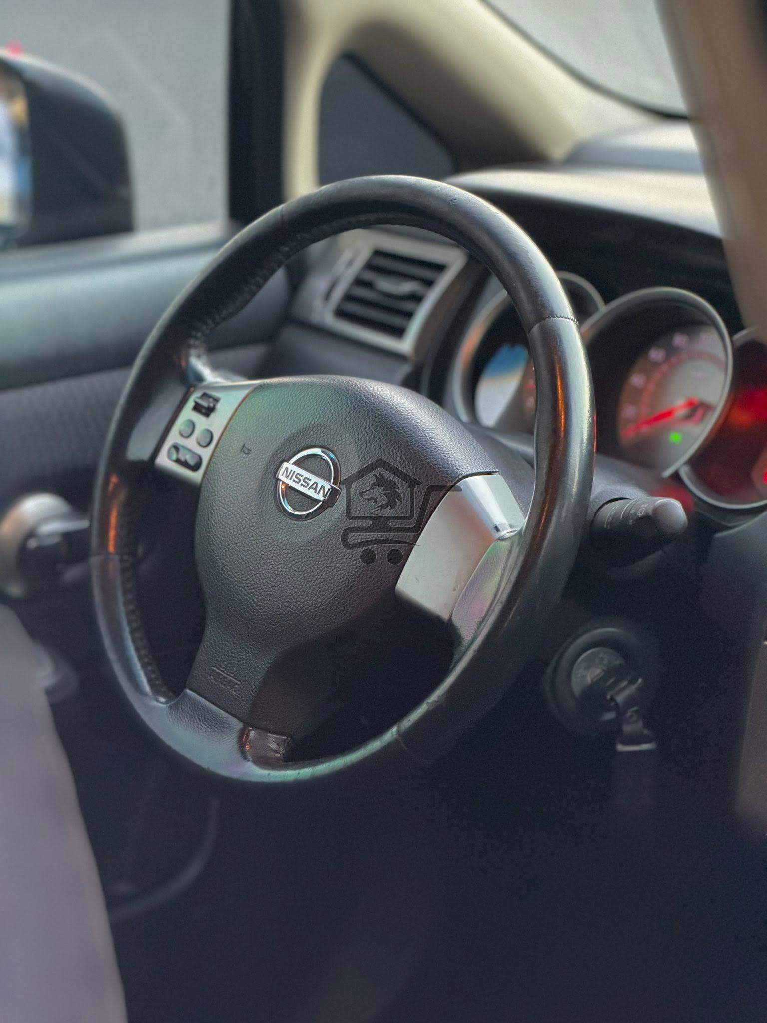 Nissan Tiida 2009 - الصورة 7