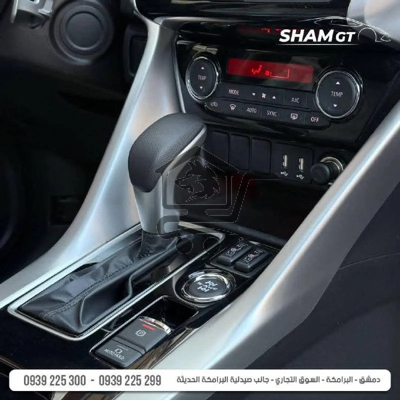 Mitsubishi E clips cross - الصورة 6