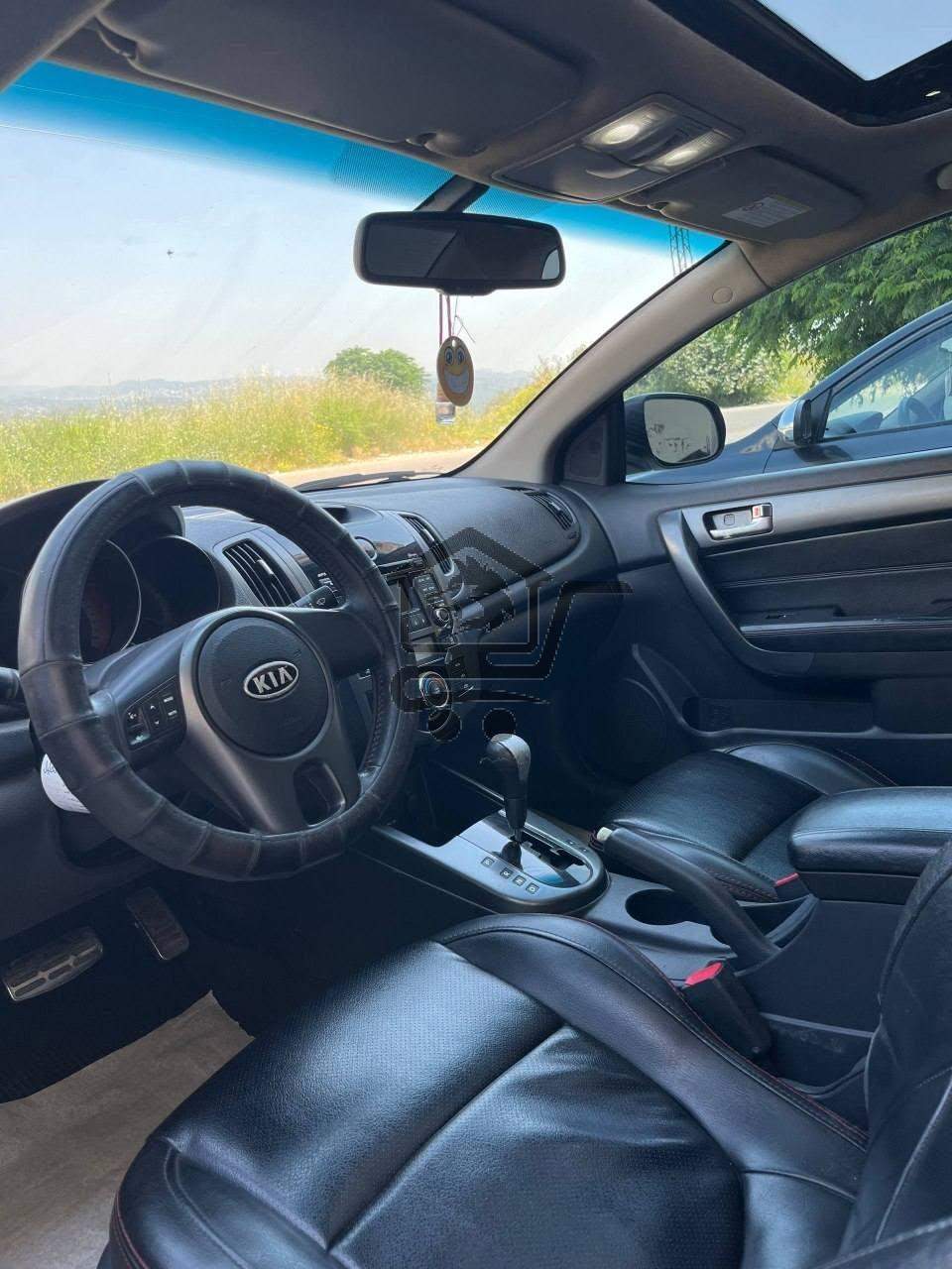 Kia Forte 2010 - الصورة 8