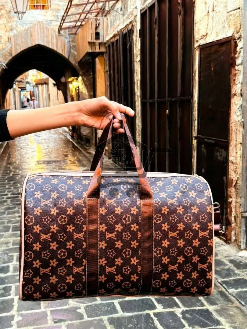 حقيبة سفر ماركة - الصورة 4