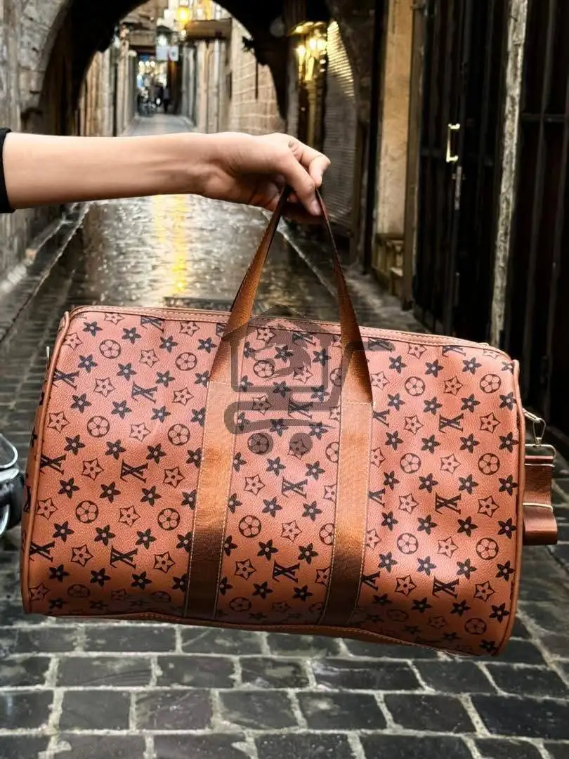 حقيبة سفر ماركة - الصورة 1