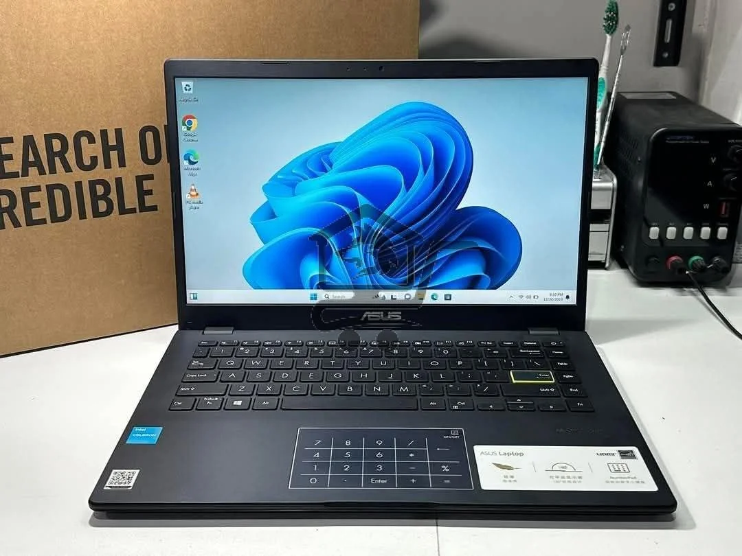 لابتوب الأعمال المكتبية من ASUS - الصورة 1