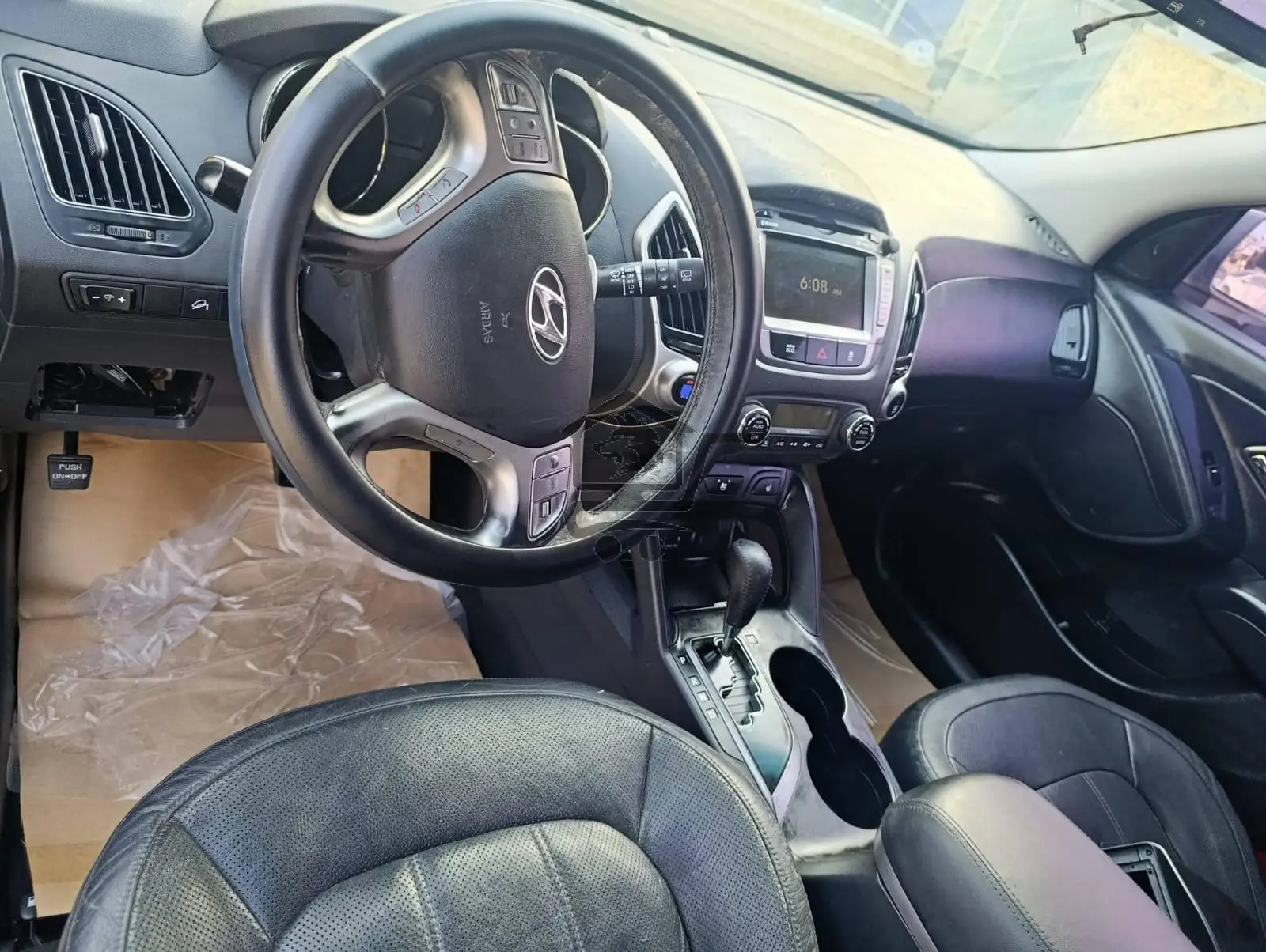 كيا توسان 2012 - الصورة 6