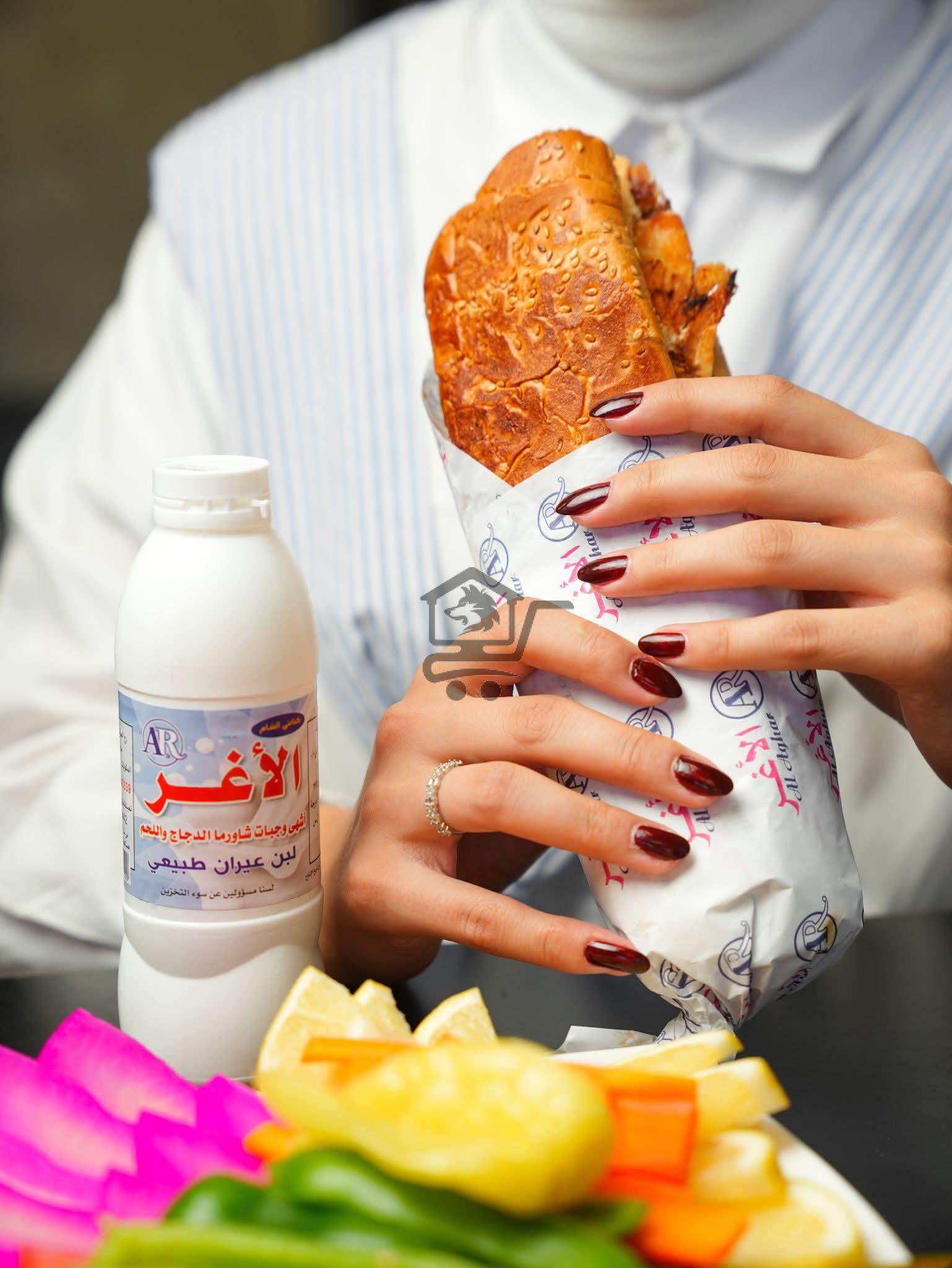 مطعم وشاورما الأغر - الصورة 6