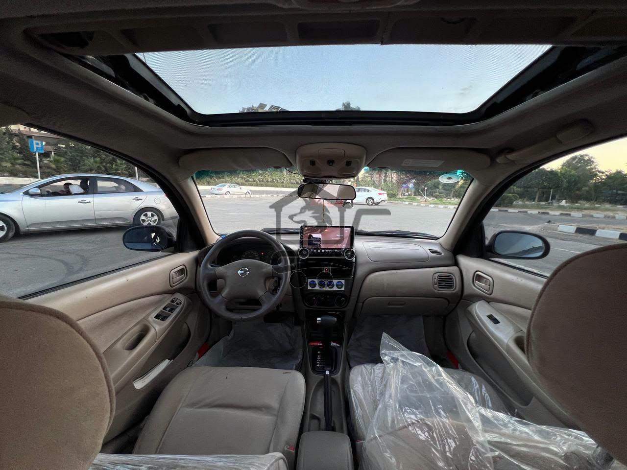 Nissan Sunny 2004 - الصورة 9