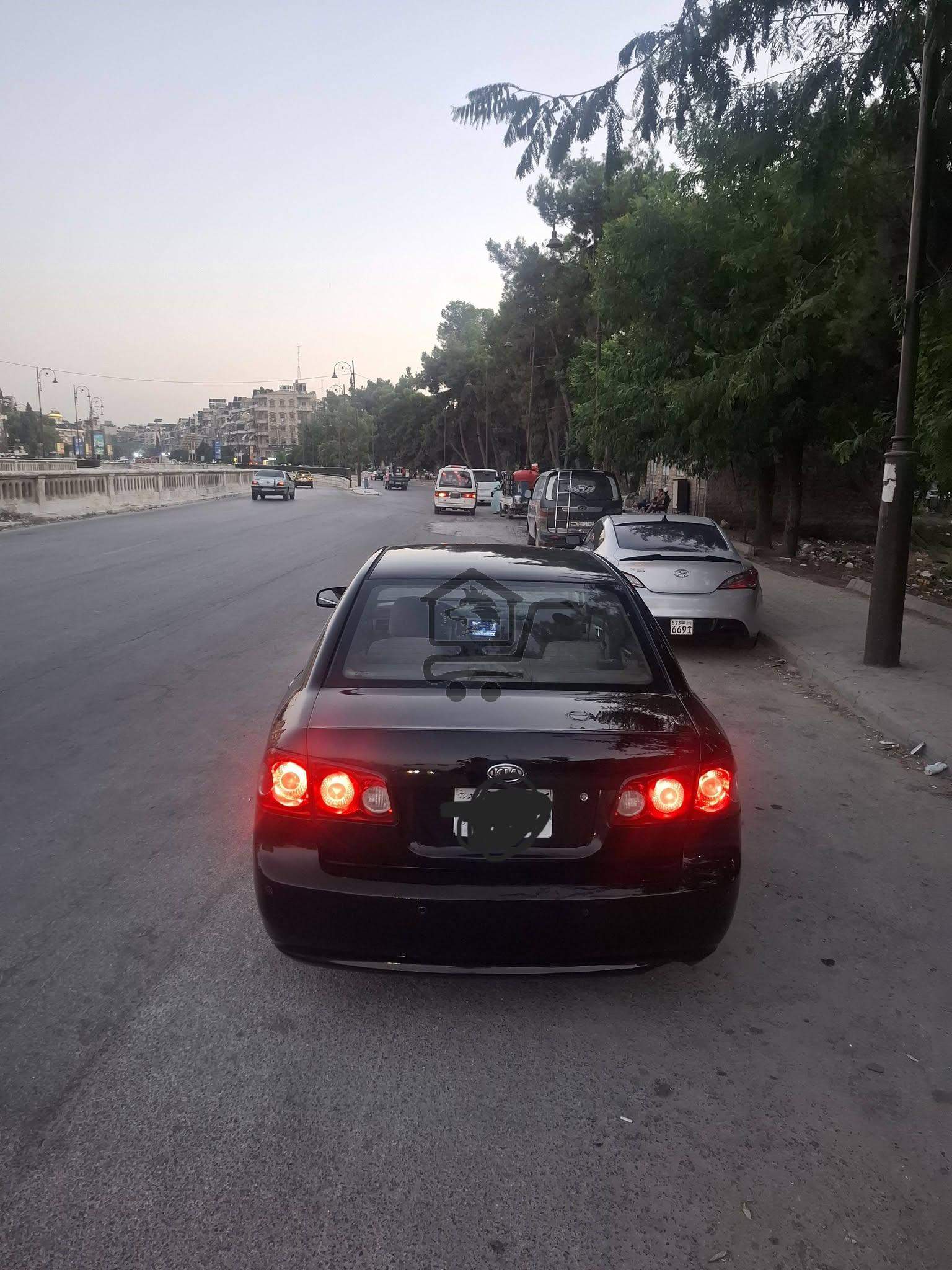 كيا اوبتما - الصورة 4