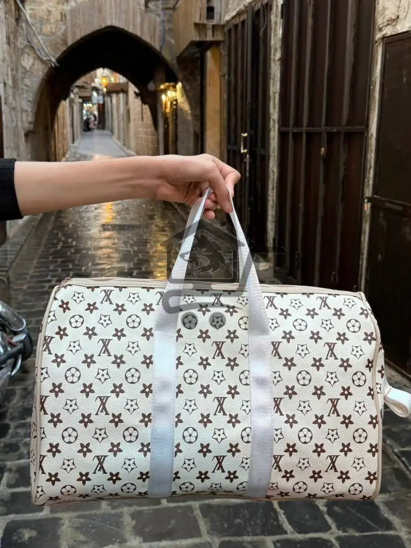 حقيبة سفر ماركة - الصورة 2