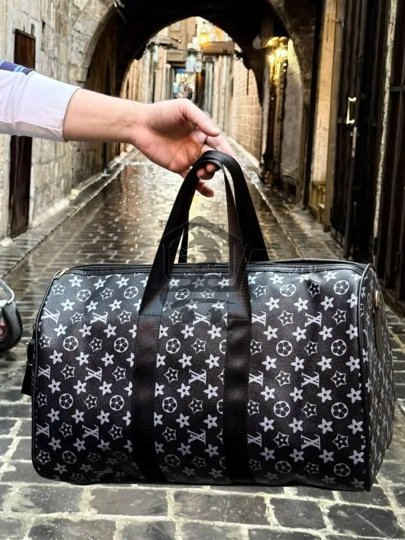 حقيبة سفر ماركة - الصورة 3