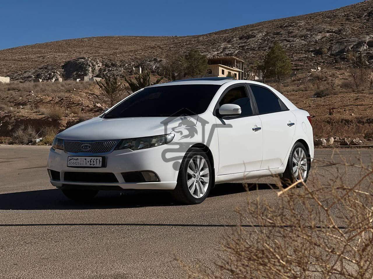 Kia Forte 2010 - الصورة 1