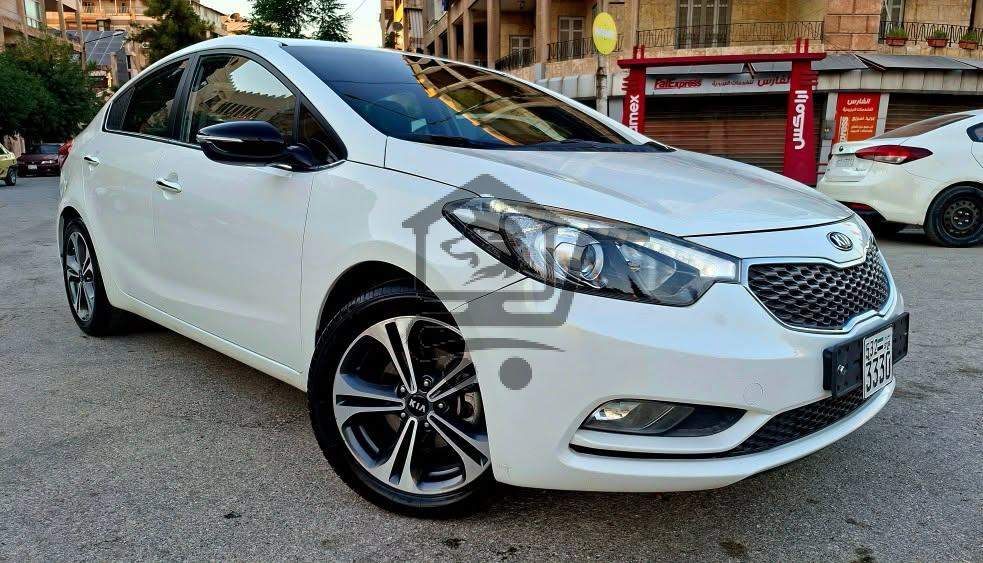 Kia Cerato 2013 - الصورة 1