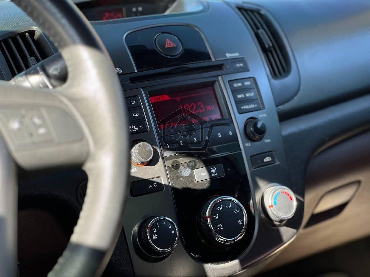 Kia Forte 2010 - الصورة 9