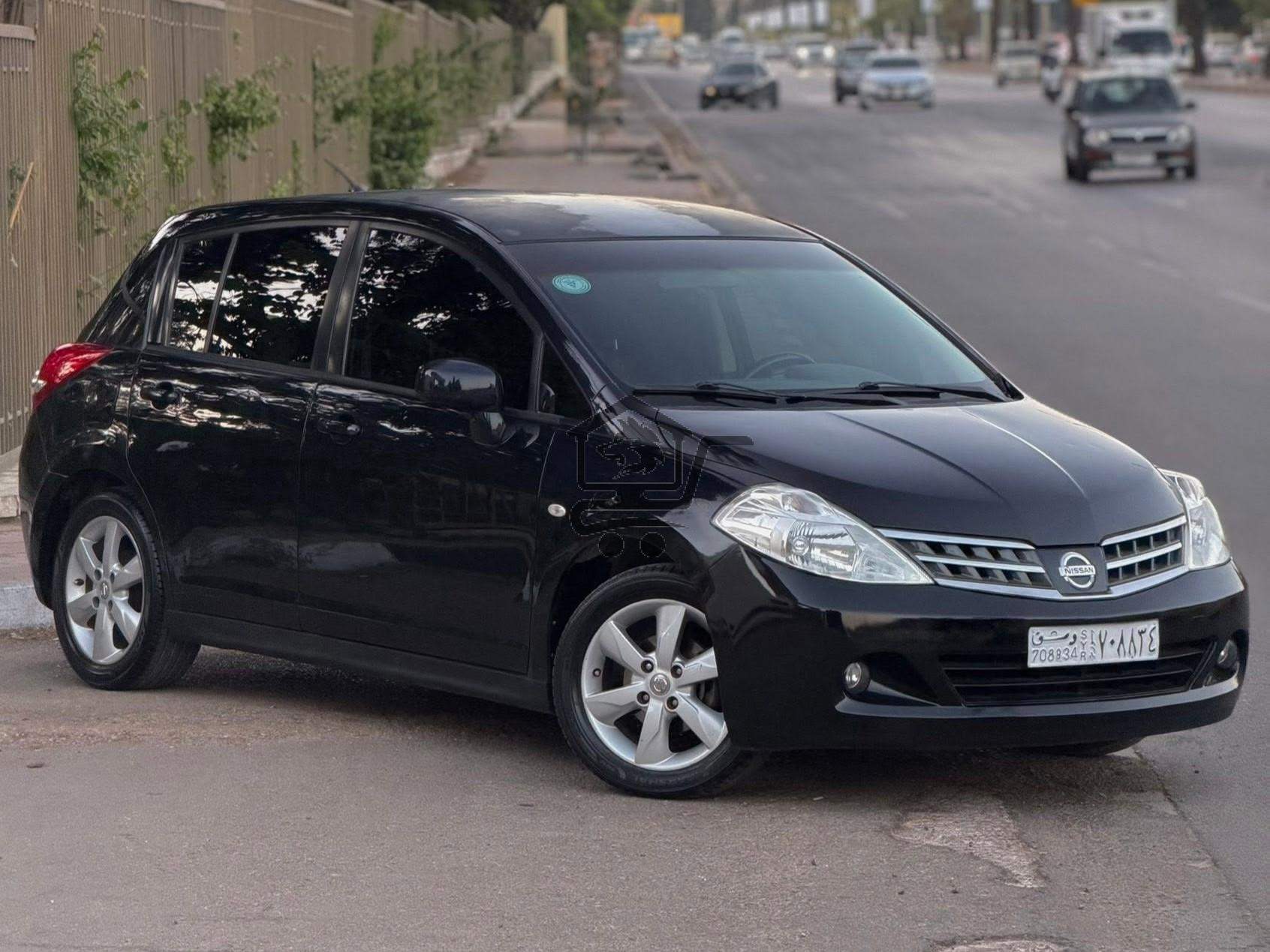 Nissan Tiida 2009 - الصورة 3